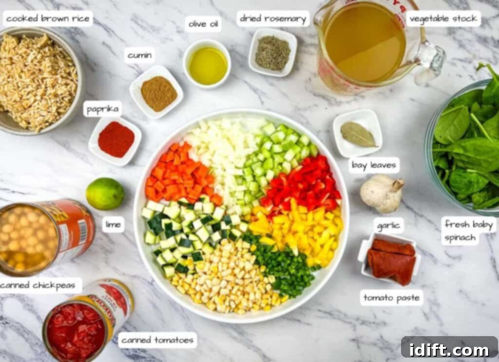 All the fresh ingredients for Copycat Panera Bread’s 10 Vegetable Soup recipe laid out with labels.