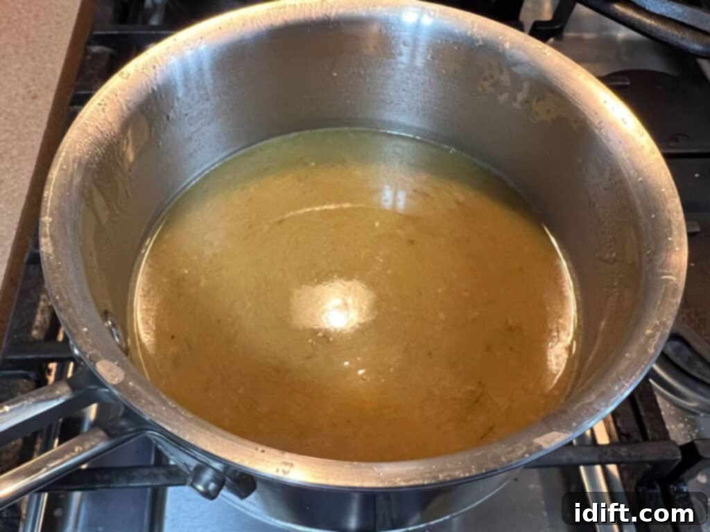 Make gravy by mixing the flour with 1/2 cup chicken broth.
