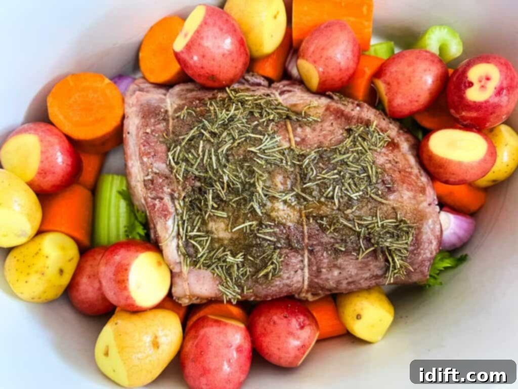 Add the carrots, celery, shallots, and baby potatoes to the slow cooker.