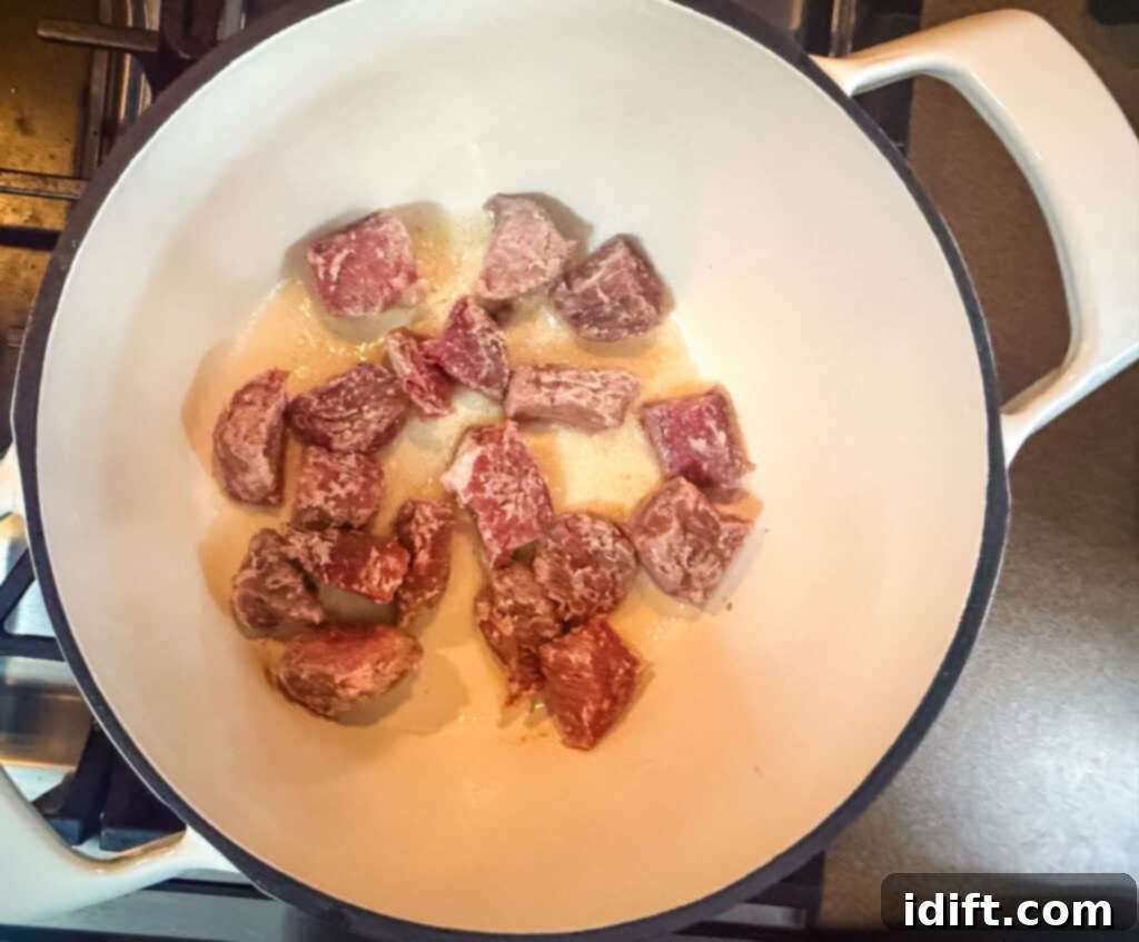 Add the beef in batches to brown it.