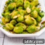 brussels sprouts with brown butter and almonds in a serving bowl