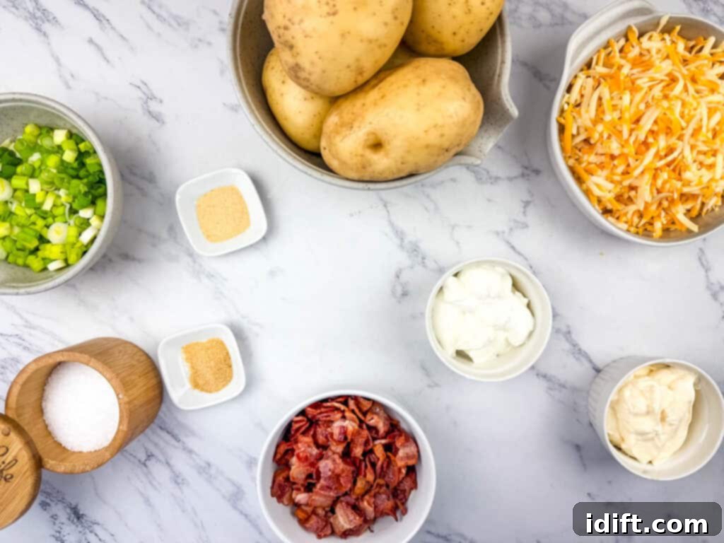 All the fresh ingredients laid out before cooking, including diced potatoes, shredded cheese, bacon, and various seasonings.