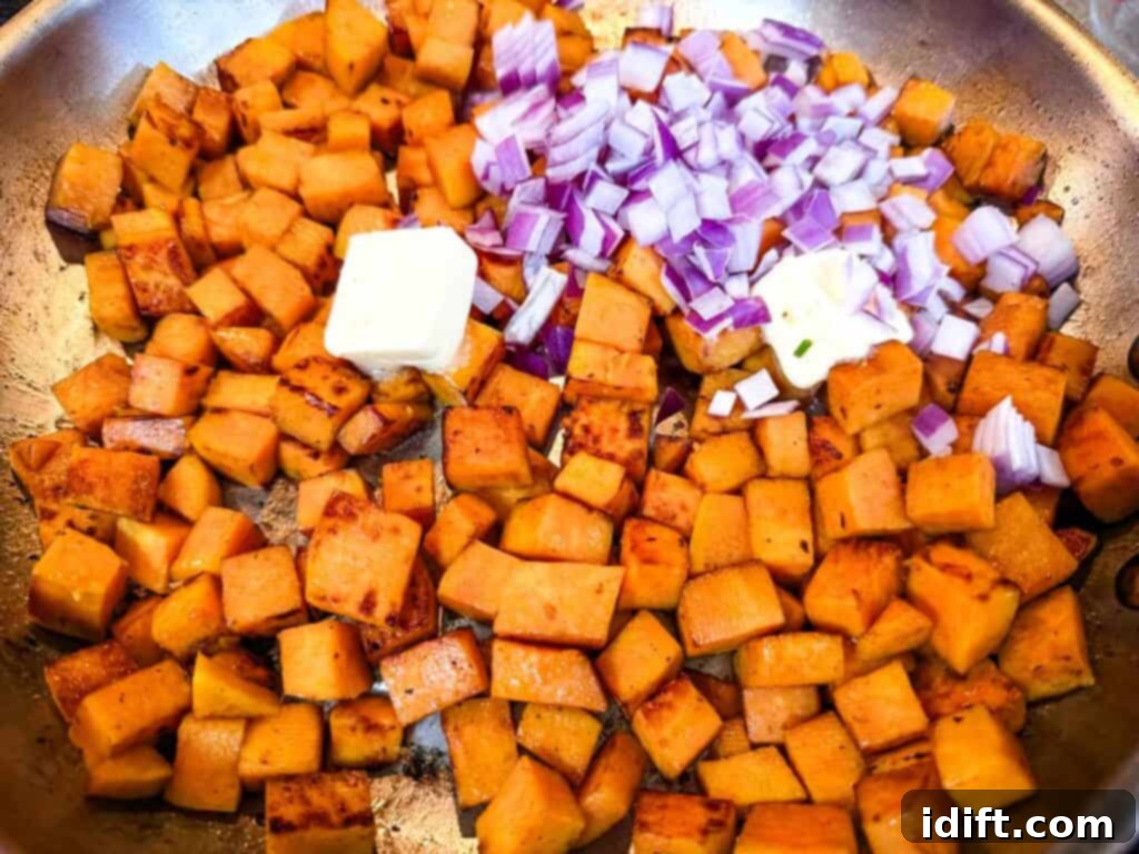 Add the butter, chopped onion, and minced garlic.