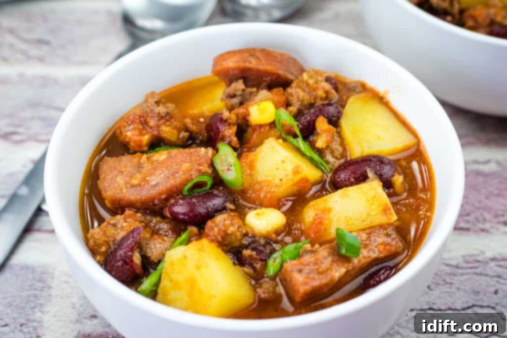 Robust Texas Campfire Stew 9 A white bowl of Texas cowboy stew.