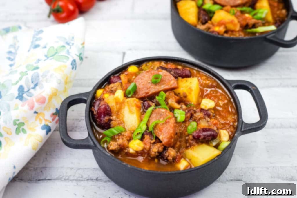 Robust Texas Campfire Stew 10 Two black skillet filled with Texas cowboy stew.