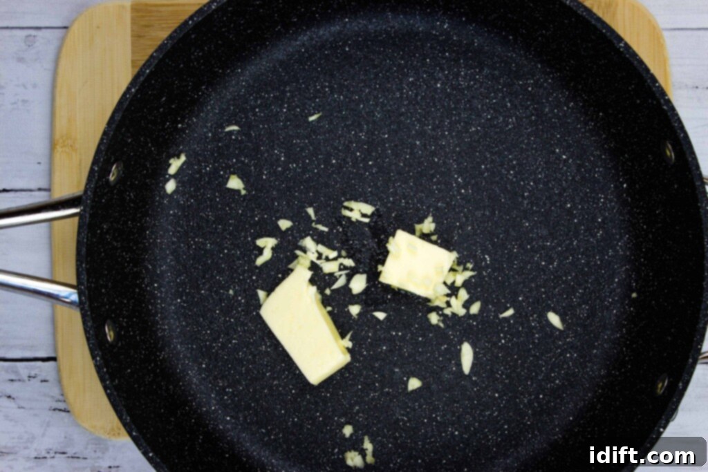 Velvety Spinach and Tomato Orzo 6 Melted butter in a large skillet, with chopped garlic just added, beginning to sauté for creamy spinach orzo.