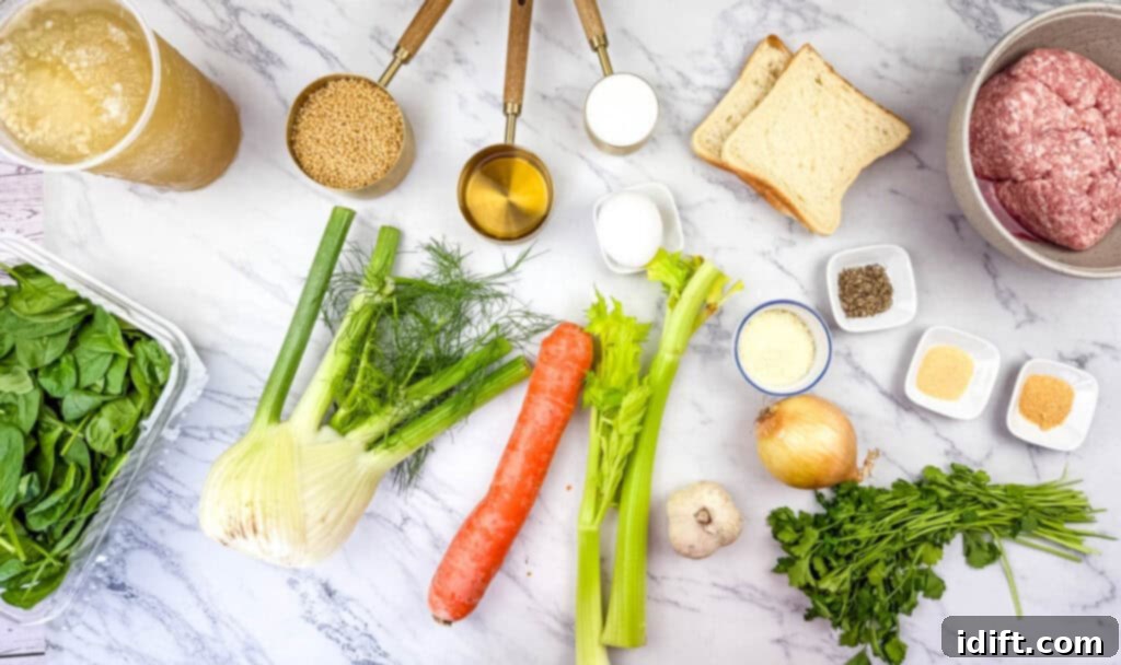 Ingredients for Italian Wedding Soup on a marble surface.