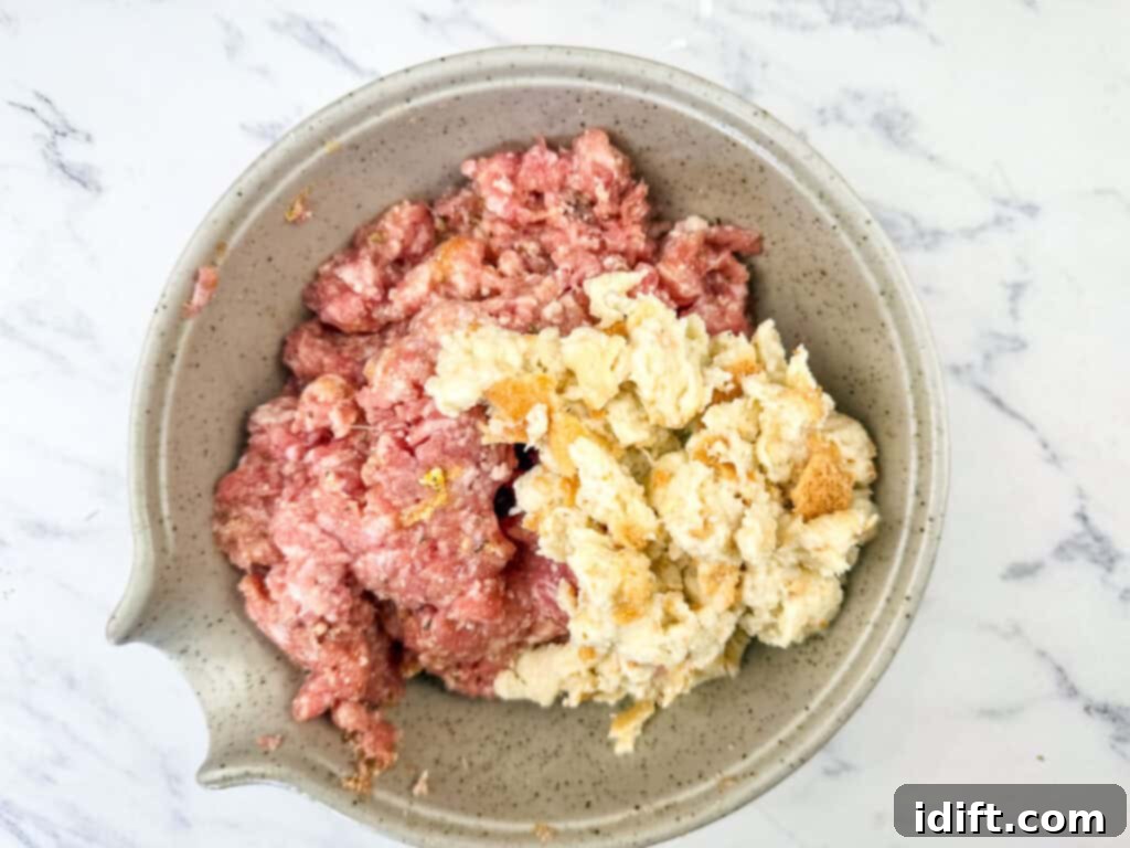 Mixture of meatball ingredients in a small bowl.