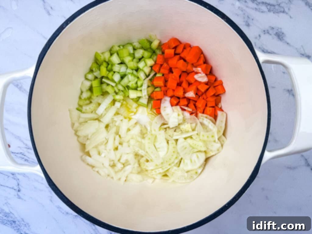 Sautéing the vegetables in cooking pot.