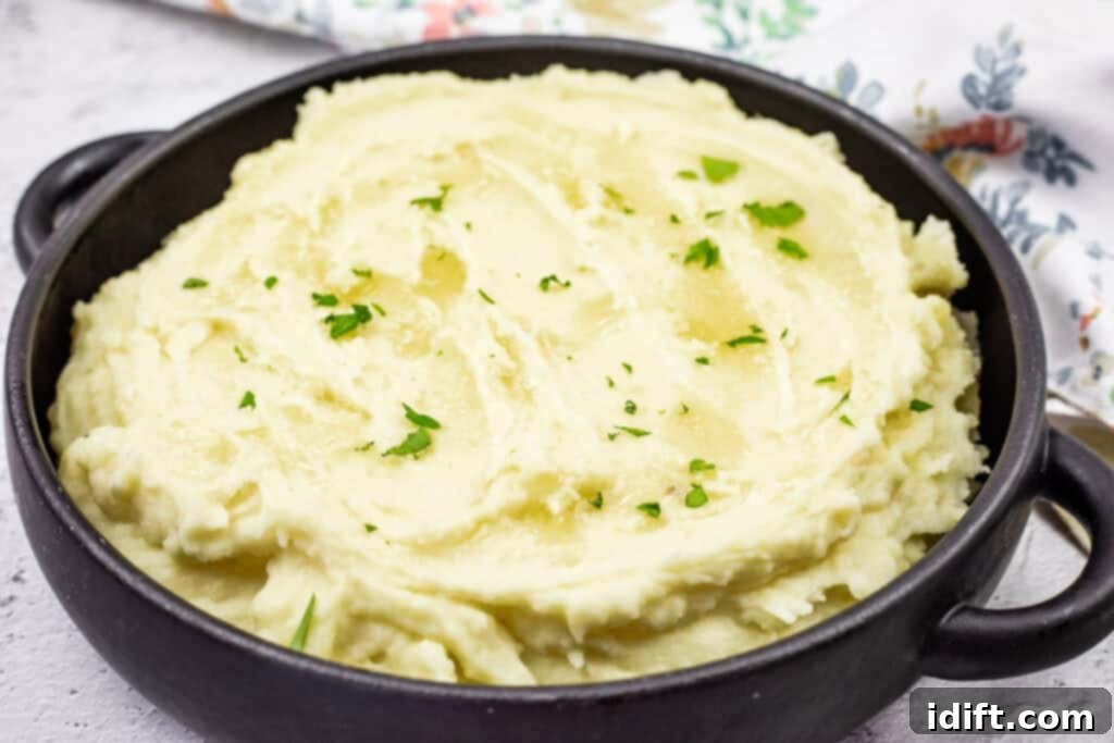 Creamy mashed potatoes in a serving bowl, ready to be enjoyed.
