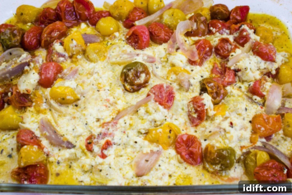 Close up of Baked Feta Pasta, showing the creamy sauce and fresh herbs.