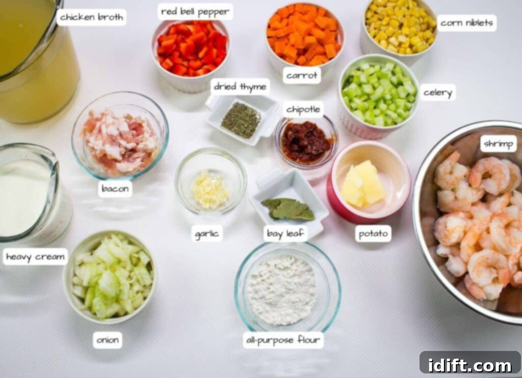 Smoky Chipotle Shrimp and Corn Chowder 4 An assortment of labeled ingredients in bowls and containers, including shrimp, vegetables, chicken broth, bacon, heavy cream, spices, and flour, arranged on a white surface.