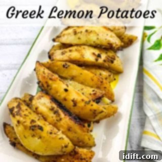 Greek lemon potatoes on a white plate.