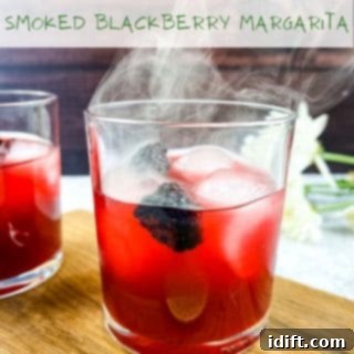 Perfectly Simple Lemonade 11 Smoked Blackberry Margarita in a glass.