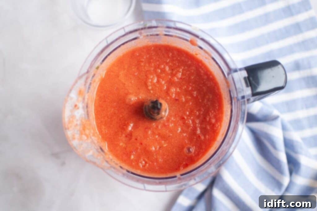 Cool and Refreshing Gazpacho 8 Chilled Classic Gazpacho in a pitcher, ready for tasting and serving.