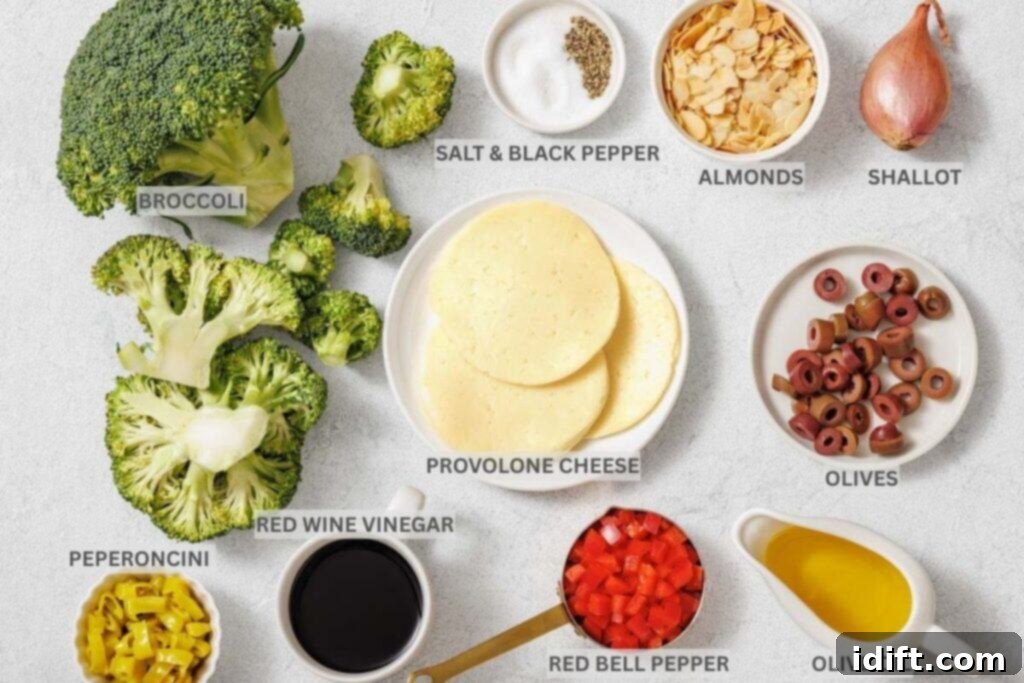 Assorted labeled ingredients including broccoli, provolone cheese, almonds, olives, shallot, red bell pepper, peperoncini, red wine vinegar, olive oil, salt, and black pepper.