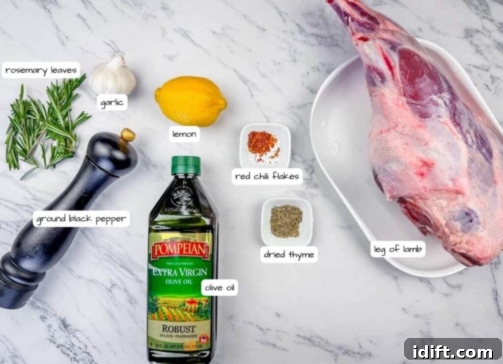 Aromatic Slow-Roasted Lamb Leg 4 Overhead shot of labeled ingredients for roast leg of lamb, including a leg of lamb, Pompeian olive oil, lemon, garlic, rosemary, thyme, and red chili flakes, neatly arranged.
