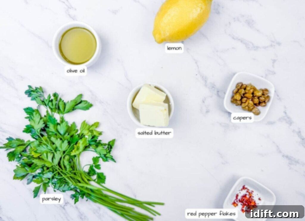 An inviting overhead shot of labeled ingredients for a delectable lemon butter sauce, featuring bright yellow lemon, glistening olive oil, a stick of rich salted butter, briny capers, a sprinkle of fiery red pepper flakes, and vibrant flat-leaf parsley.