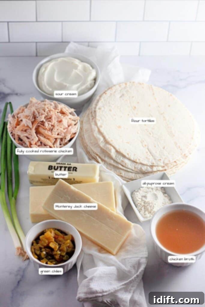 Velvety Chicken Enchiladas 4 Ingredients for a delicious White Chicken Enchiladas recipe artfully arranged on a kitchen countertop, including flour tortillas, creamy sour cream, pre-cooked rotisserie chicken, rich butter, all-purpose flour, blocks of Monterey Jack cheese, savory chicken broth, a can of diced green chiles, and fresh green onions.