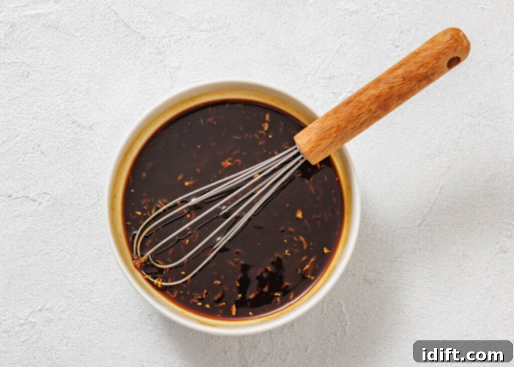 Lettuce wraps with meat and vegetables on a white table.