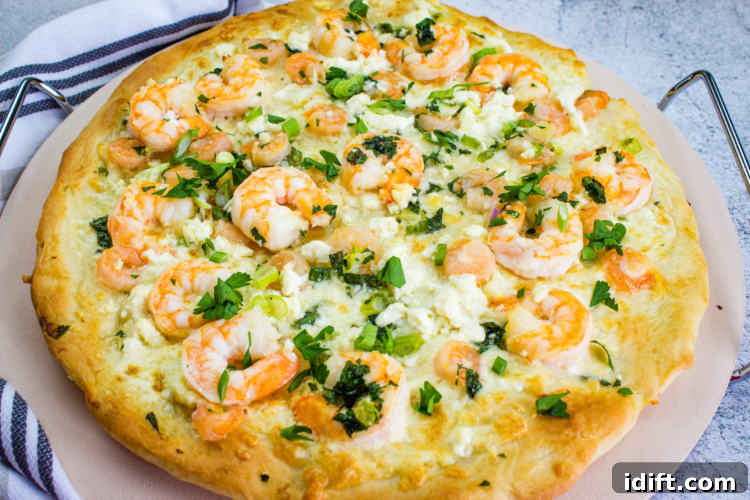 21 Halloween Bites So Good They'll Vanish Before Any Costume Compliments 17 A pizza with shrimp and cheese on top.