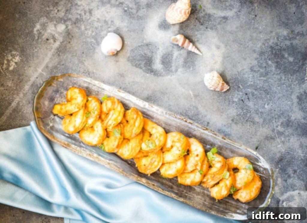 21 Halloween Bites So Good They'll Vanish Before Any Costume Compliments 21 Two pans of smoked shrimp on a table.