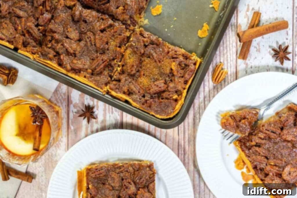 Pecan slab pie served on plates with apple cider