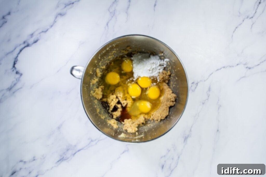 Ingredients being added to mixing bowl