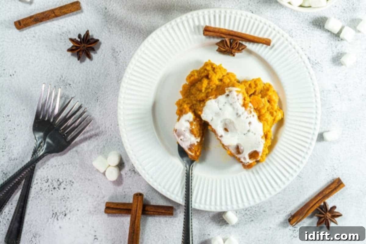 Timeless Kitchen Treasures: Rediscovering Vintage Recipes 11 Sweet Potato Casserole topped with gooey, toasted marshmallows.