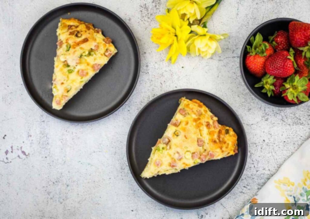 Two Ham & Cheese Scones on black plates