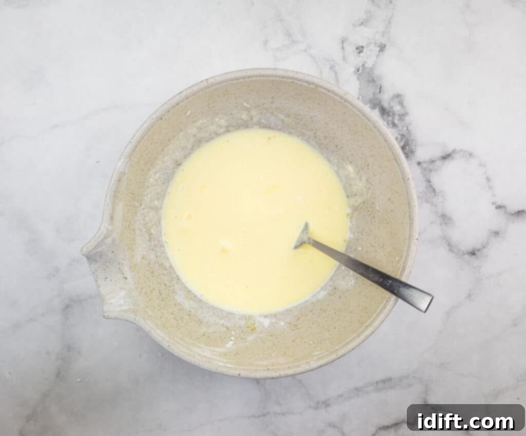 Mixing wet ingredients in a bowl